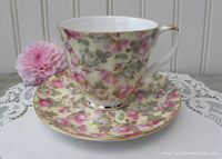 Chintz Pink and White Cottage Roses on Yellow Teacup and Saucer