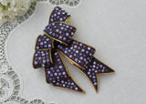 Signed Joan Rivers Brooch Purple Rhinestones Ribbon Bow Pin