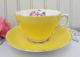 Vintage Yellow Teacup and Saucer with Pink Roses and Daisies