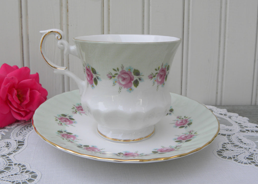 Vintage Tea Cup and Saucer,marking on bottom,green/gold,excellent cond