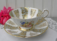 Vintage Paragon Wild Roses Green and Gold Teacup and Saucer