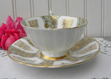 Vintage Paragon Wild Roses Green and Gold Teacup and Saucer