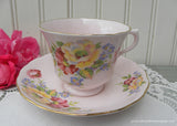 Vintage Pink Teacup and Saucer with Wild Roses and Forget Me Nots