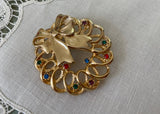 Vintage JJ Christmas Wreath Pin with Bow and Rhinestones