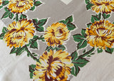 Vintage Yellow Chrysanthemums on Gray Tablecloth