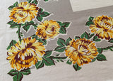 Vintage Yellow Chrysanthemums on Gray Tablecloth