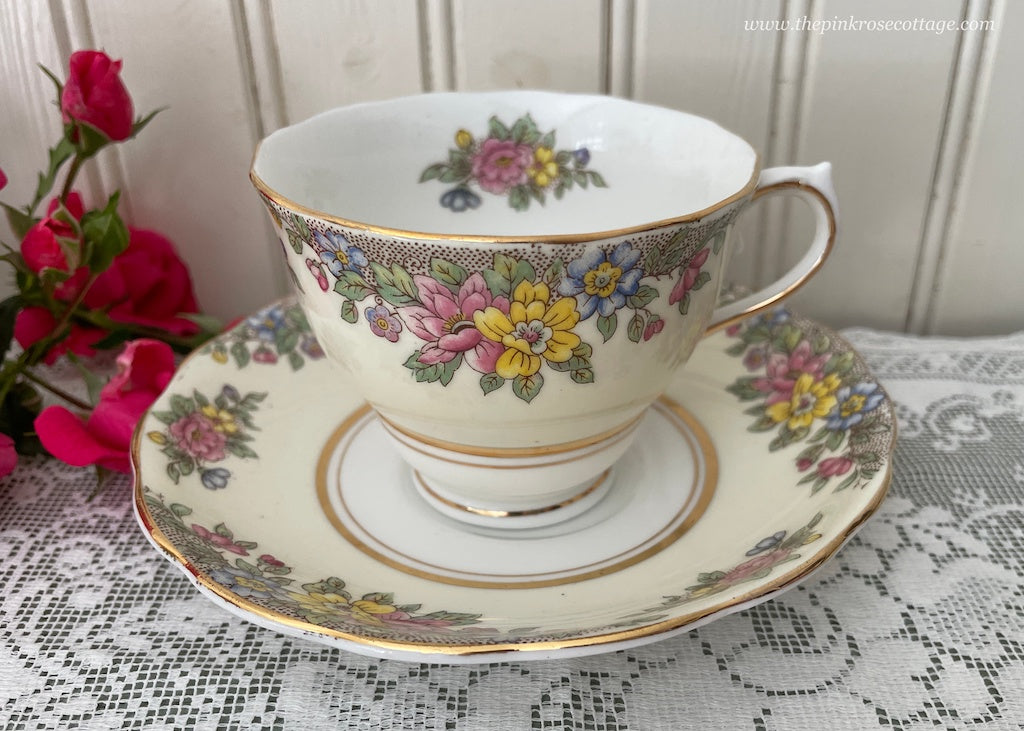 Vintage Pink and Yellow Wild Roses Teacup and Saucer