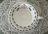 A Cup of Christmas Tea Teacup and Saucer by Warren Hanson Larger - The Pink Rose Cottage 