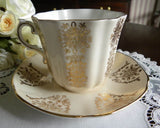 Vintage Creamy Peach with Gold Accents Teacup and Saucer - The Pink Rose Cottage 