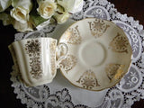 Vintage Creamy Peach with Gold Accents Teacup and Saucer - The Pink Rose Cottage 