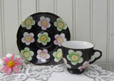 Vintage Demitasse Teacup and Saucer Black with Colorful Daisies
