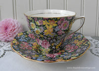 Vintage Rosina Black Chintz Teacup and Saucer Pink Roses Daffodils and More