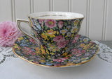 Vintage Rosina Black Chintz Teacup and Saucer Pink Roses Daffodils and More