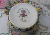 Vintage Rosina Black Chintz Teacup and Saucer Pink Roses Daffodils and More