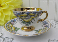 Vintage Rosina Pedestal Yellow Pink Roses and Gold Teacup and Saucer