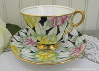 Vintage Adderley Stylized Pink and Yellow Roses on Black Chintz Teacup and Saucer - The Pink Rose Cottage 
