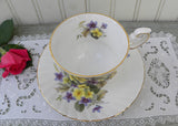 Vintage Queen's China Teacup and Saucer Yellow Primrose and Purple Violets