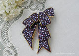 Signed Joan Rivers Brooch Purple Rhinestones Ribbon Bow Pin