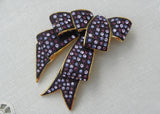 Signed Joan Rivers Brooch Purple Rhinestones Ribbon Bow Pin