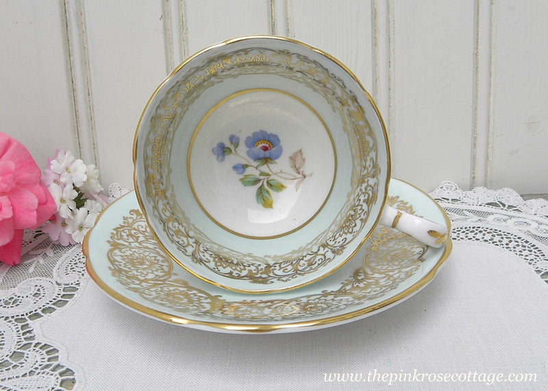 PARAGON Floral fashion on Cobalt Blue Coffee Can Cup and Saucer Demitasse Gold Trim