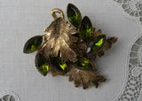 Vintage Brushed Gold Tone Brooch with Green Rhinestones