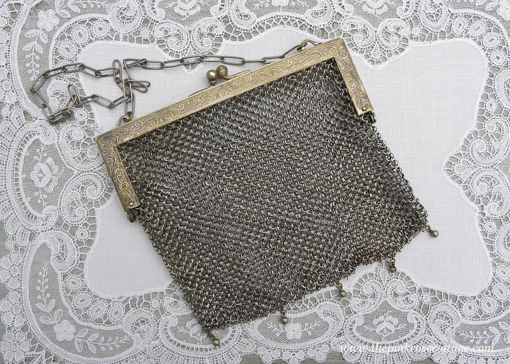 A fine example of an antique sterling silver Victorian purse. Hallmarked  Birmingham, with a makers m