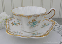 Vintage Royal Tara Teal Blue Roses and Daisies Teacup and Saucer
